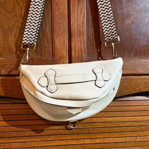 Elegant Cream Crossbody Bag with Patterned Strap